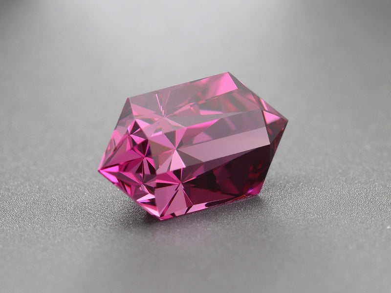 Tara Coomber, UK jeweller British Gem cutter, faceter, lapidary, using ULTRA TEC faceting machine cutting precision designer bespoke gems for sale, gem cutting gemstones, cut gem trade service, repairs, re-polishing, restoration gem, umbalite garnet