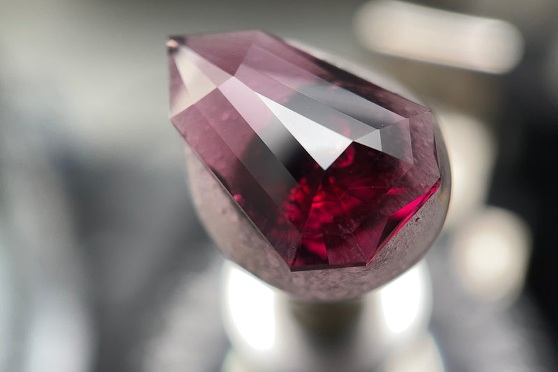 Tara Coomber, UK jeweller British Gem cutter, faceter, lapidary, using ULTRA TEC faceting machine cutting precision designer bespoke gems for sale, gem cutting gemstones, cut gem trade service, repairs, re-polishing, restoration of gem, umbalite garnet 